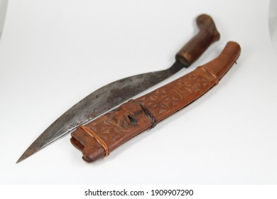 An Old Island Bolo Knife With Carved Wooden Sheath