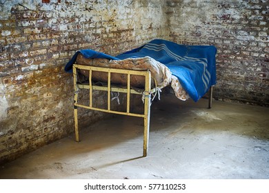 Old jail bed - Powered by Shutterstock - Get 15% off with code: PIKWIZARD15
