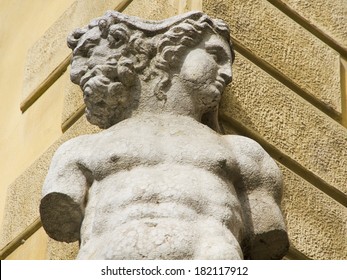 Old Janus sculpture in Reggio Emilia, Italy