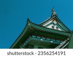 An old Japanese castle built on a small mountain