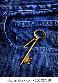 Old jeans with an antique key in pocket