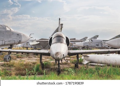 Old Jet Plane Stands At An Abandoned Airfield