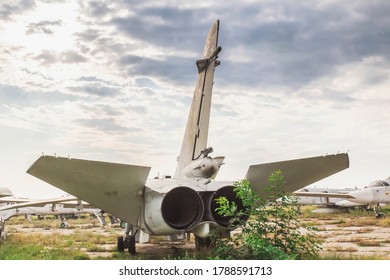 Old Jet Plane Stands At An Abandoned Airfield