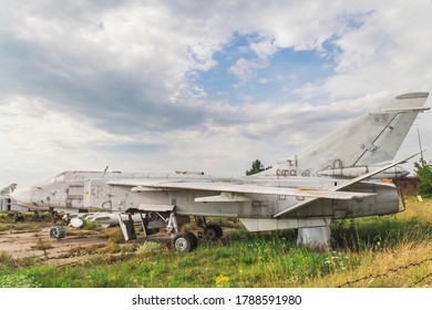 Old Jet Plane Stands At An Abandoned Airfield