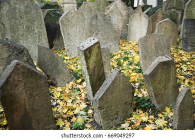 Old Jewish Cemetery In Prague, Czech Republic. A Grave Stone Of A Medieval Jewish Burial. Jewish Quarter Of Prague.