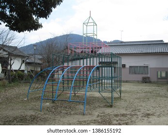 A Old Jungle Gym In A Small Park