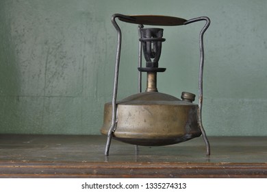 Old Kerosene Stove On The Table.