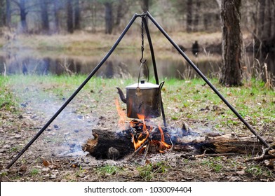 Old Kettle Is Burning At The Stake Outdoors