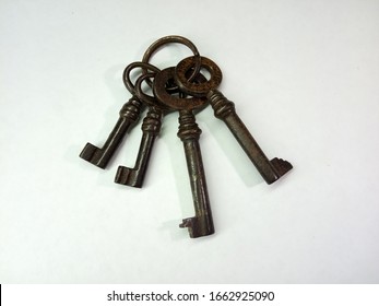 Old key isolated on white background