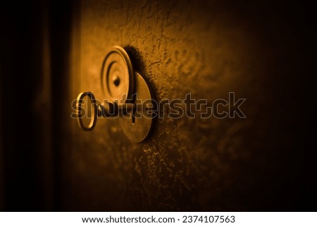 Old key in keyhole. Concept and Idea for History, education, freedom, business, security, secret background.