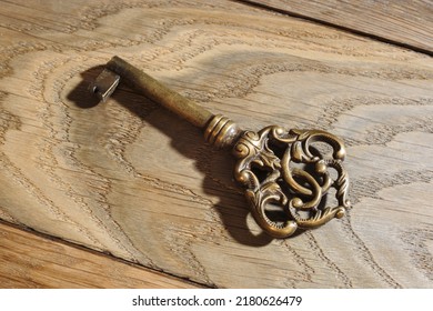 The Old Key On The Wooden Boards. 