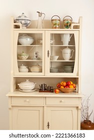 Old Kitchen Cabinet With Old Crockery