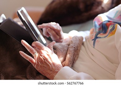 An Old Lady On Her Tablet