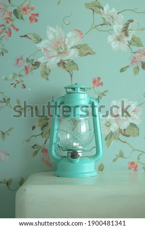 Old Lantern and sweet flower pattern background .vintage style