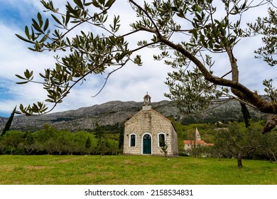 Old Latin Church In Valley On A Spring Day