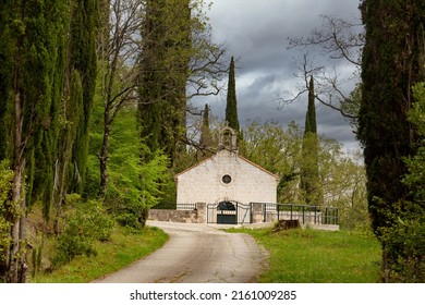 Old Latin church in valley on a spring day - Shutterstock ID 2161009285