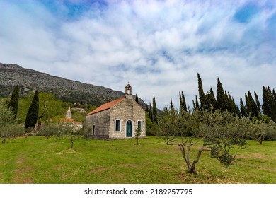 Old Latin Church In Valley On A Spring Day