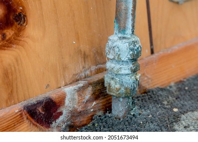 Old Leaking Pipe With Water And Limescale Damage On Old Carpet And Wood Panelling