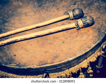 Old Leather Drum And Drumsticks - Membrane Musical Instrument. Ancient Ethnic Music On A Folk Festival. Timpani Or Kettledrums - Old Musical Instruments In Percussion Family Of Classical Orchestra.