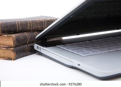 Old Legal Books With Modern Laptop On White Background