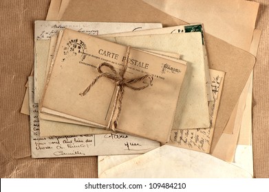 Old Letters And French Post Cards. Vintage Background