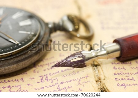 Old letters and pen as a background