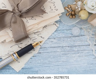 old letters and pen in the vintage arrangement