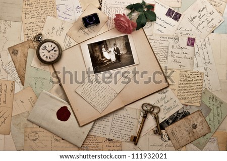 old letters, photographs and post cards. nostalgic vintage wedding background