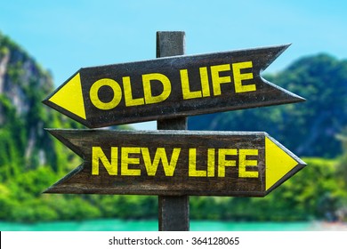 Old Life - New Life Signpost In A Beach Background