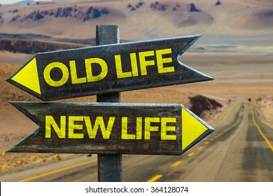 Old Life - New Life Signpost In A Desert Road On Background