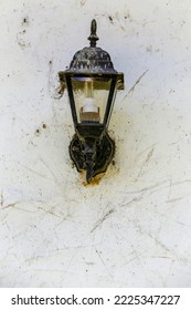 Old Light Fixture On The White Wall. Brazil