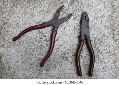 Old Lineman's Pliers On Old Concrete Floor