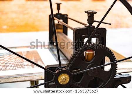 Old lithographic press close up