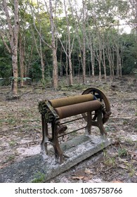 Old Local Rubber Extrusion Machine Used By Hand In Tapping Rubber, Rubber Plantation Lifes, Rubber Trees In Thailand.