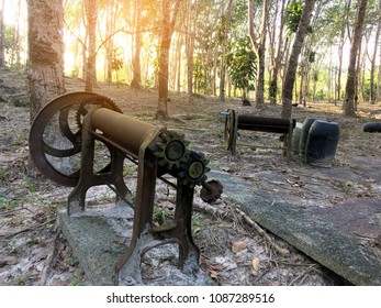 Old Local Rubber Extrusion Machine Used By Hand In Tapping Rubber, Rubber Plantation Lifes, Rubber Trees In Thailand.