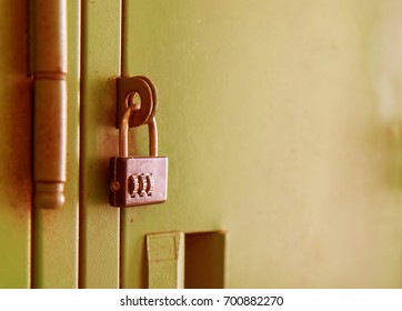 Old Lock On The Locker. Lock On The Door Of An Old Locker, Vintage Style, Close-up Focus On Lock.