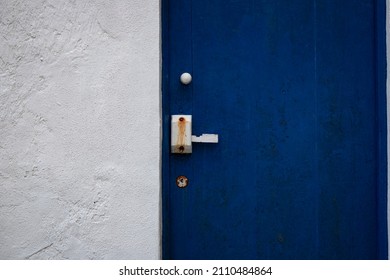 Old locksmith blue door, Corvo island.