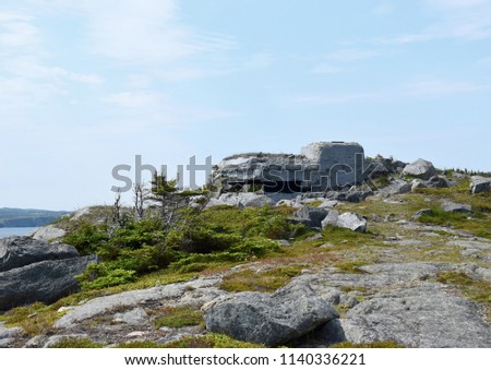 old lookout bunker along the Father Troy Trail in the Summer, near Flatrock Avalon region of Newfoundland Canada