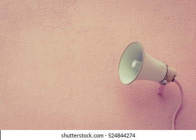 Old Loud Speaker On The Cement Wall Background