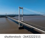 The old M48 Severn bridge from England to Wales. Medium aerial shot