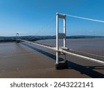 The old M48 Severn bridge from England to Wales. Medium aerial shot