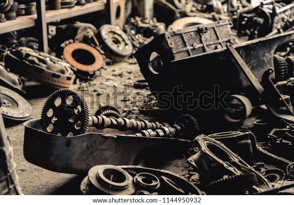 Old machine\
parts in second hand machinery\
shop