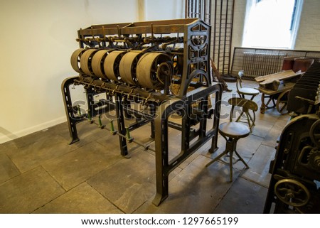 Old machinery from a cotton mill in an industrial Victorian factory