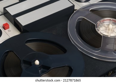 Old Magnetic Tape Recorder On A Gray Table Background, Close-up