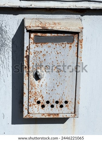 old mailbox on the gate