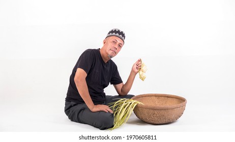 The Old Malay Man Weaving Ketupat Coconut Leaf. Ketupat Is The T