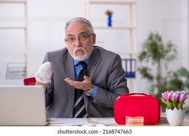 Old Male Employee Cutting His Hand In The Office