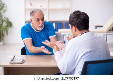 Old Male Patient Visiting Young Male Doctor