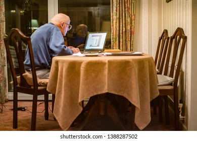 Old Man Of 93 Years Having Trouble Using His Computer To Check His Finances Online,very Challenging For Old People.