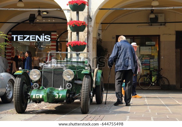 Old man and old car. Annual Race 1000 miles. Brescia\
Italy, May17 2017